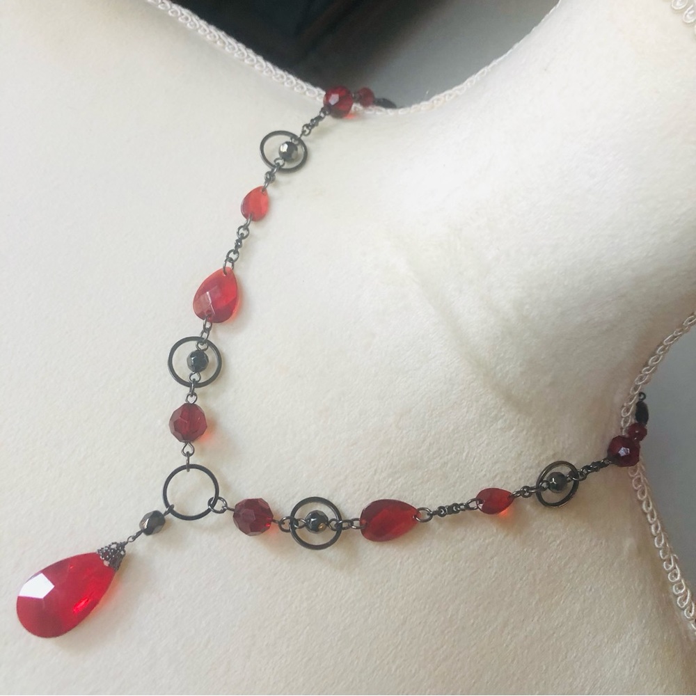 Faceted vampire blood glass gunmetal floating bead necklace